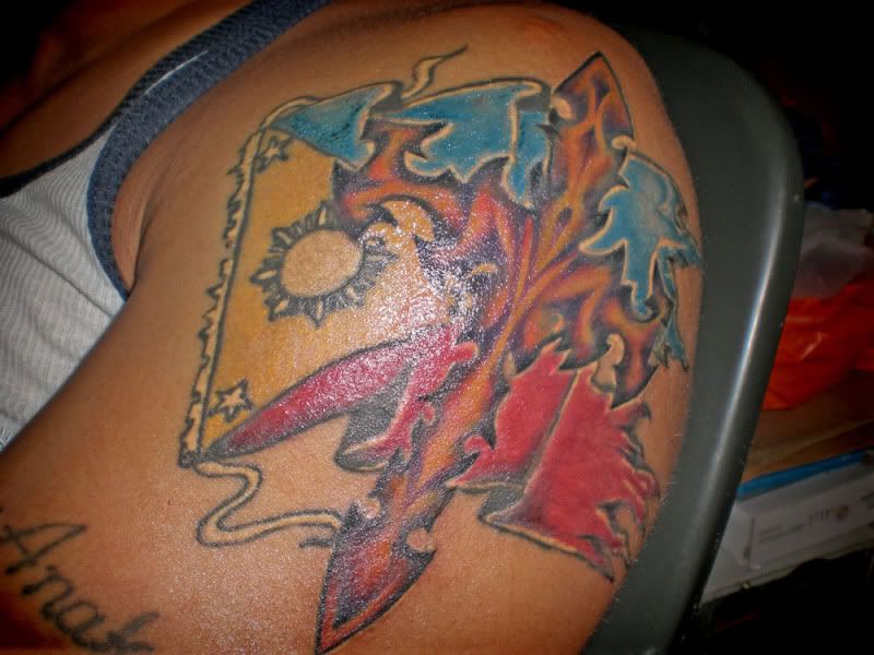 J.R. Celski tattoo close-up. On the Philippine flag, in the white triange,