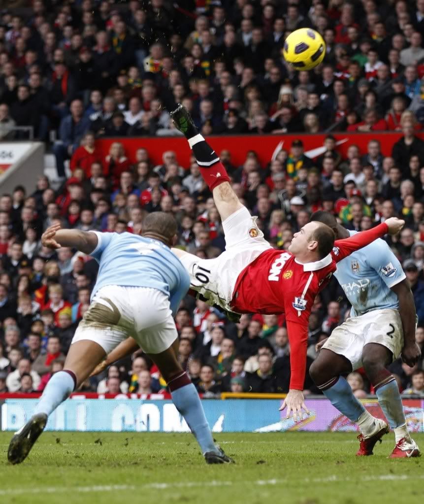 89826-manchester-uniteds-wayne-rooney-scores-against-manchester-city-from-an.jpg